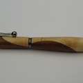 0049 - Segmented Black Titanium Slimline (35407 visits) The elegantly curved barrels on this pen are constructed out of Maple and Padauk. Each piece is care... 0049 - Segmented Black Titanium Slimline