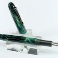 C003 - Jade Swirl Cocalico Fountain Pen (22225 visits) Intersected by white ribbons, the metallic jade green shimmers in the light. With classic, rounded s... C003 - Jade Swirl Cocalico Fountain Pen